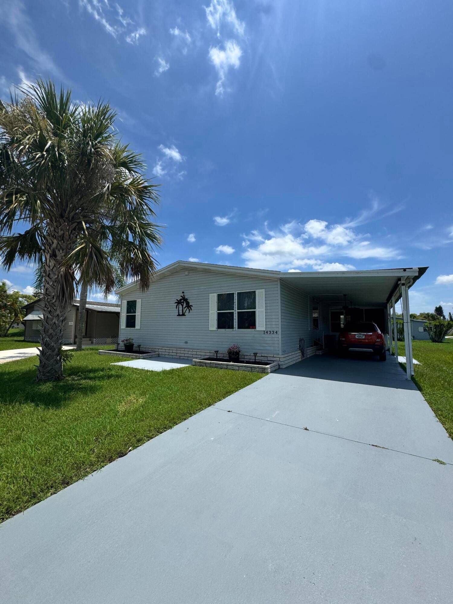Lovely 3 bedroom 2 bath home in the desirable 55 community of Spanish Lakes Fairways.