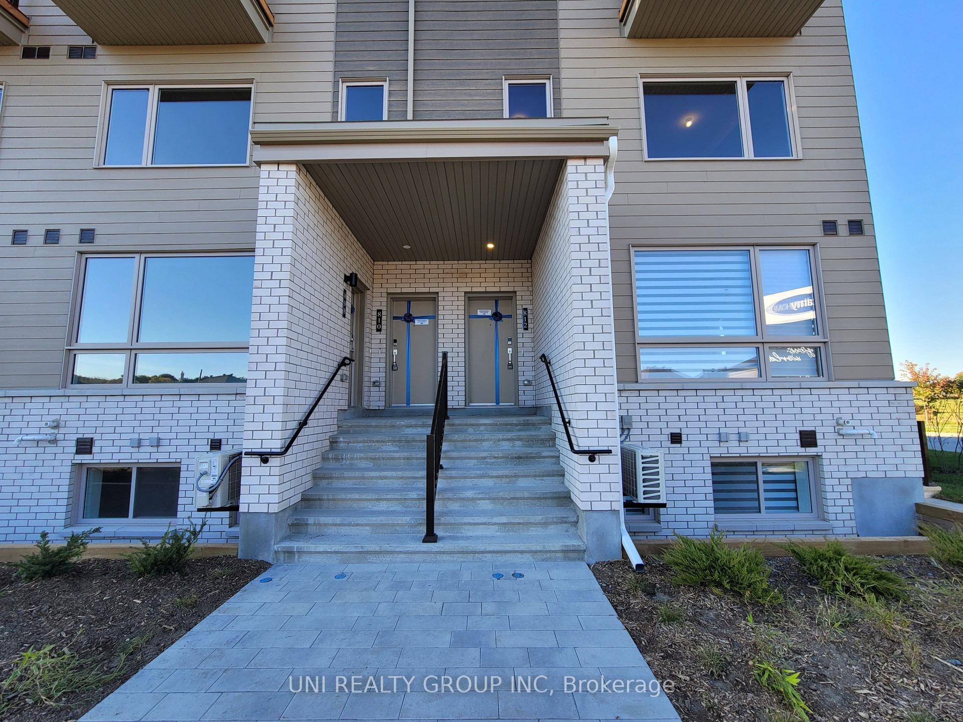 Welcome to this luxury very new 2 bed 2 bath stacked townhome with ROOFTOP TERRACE at rockcliffe's new wateridge village !