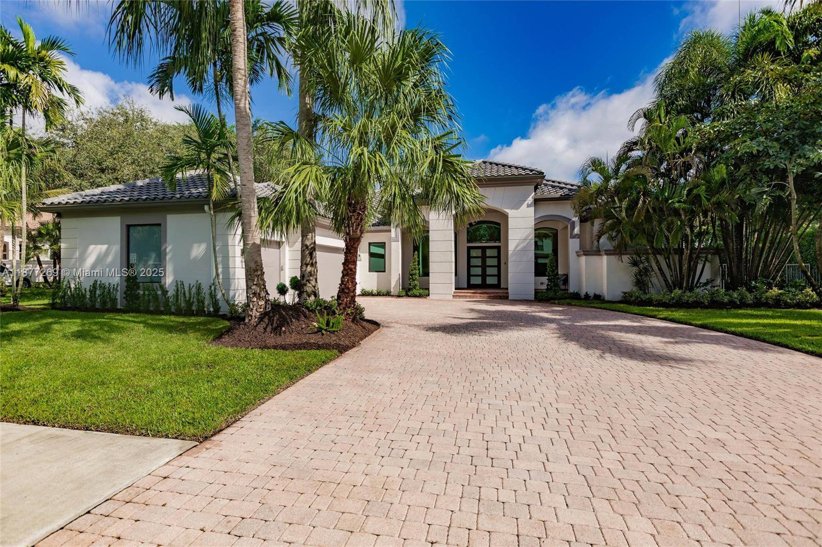 Impeccable turnkey 1 story, 5BR 4BA office home in guard gated Stonebrook Estates.