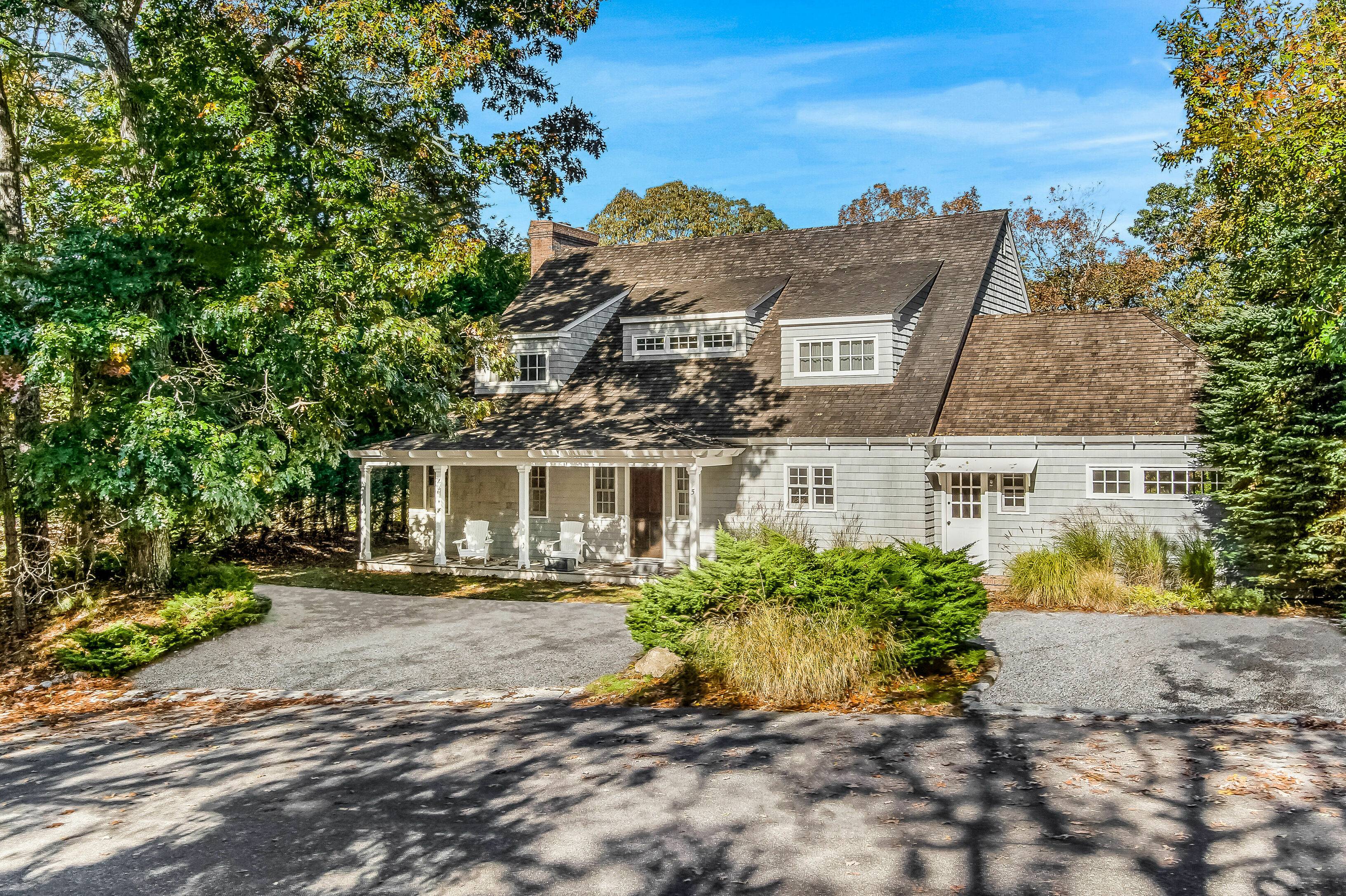 FALL IN LOVE WITH THIS CLASSIC EAST HAMPTON SHINGLE STYLE HOME 