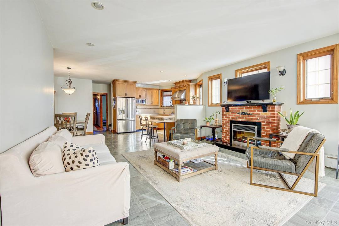 Welcome to 66 71 74th Street, a rare multi level mother daughter single family home in the desirable neighborhood of Middle Village.