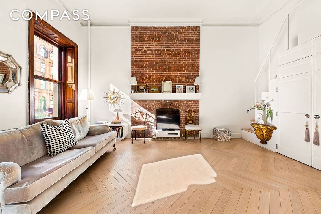 On the Parlour floor of a historical Brownstone co op is this sparkling, south facing, sun filled jewel of a home your perfect perch above tree lined 75th Street to ...
