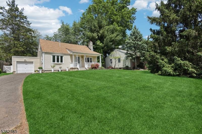 Welcome to this move in ready 4 bedroom, 2 full bath Cape Cod located in desirable Colonia, NJ.