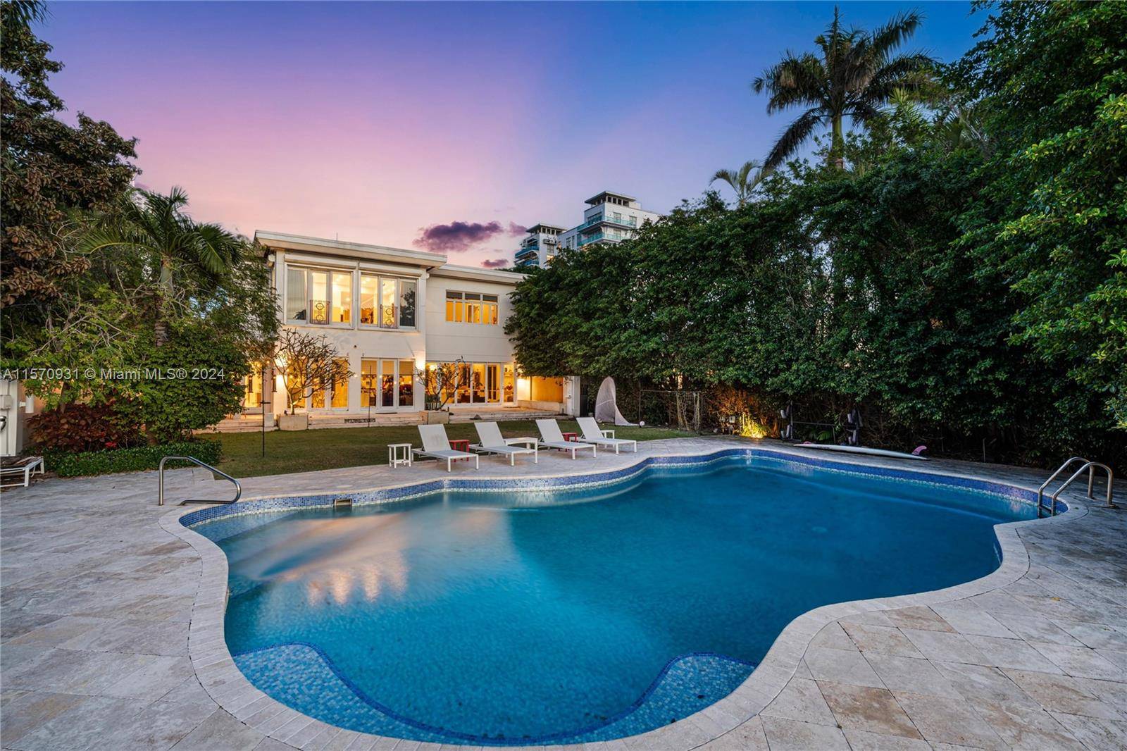 Gorgeous contemporary masterpiece nestled on this expansive 16, 200 SF lot within the prestigious and guarded enclave Allison Island in Miami Beach.