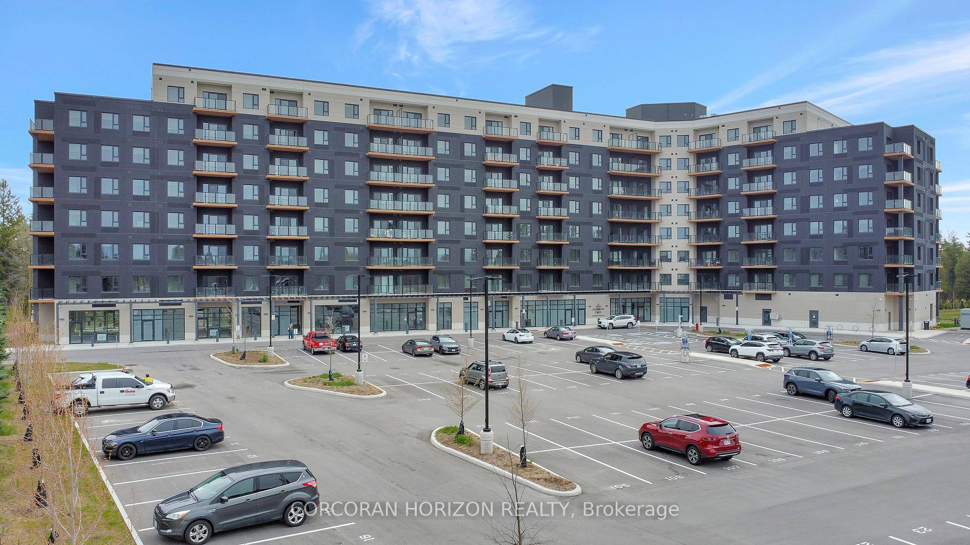 Welcome to Unit 720 at The Flats at Rainbow Lake a beautifully designed 1 bedroom, 1 bathroom condo that offers the perfect blend of modern comfort and natural serenity.
