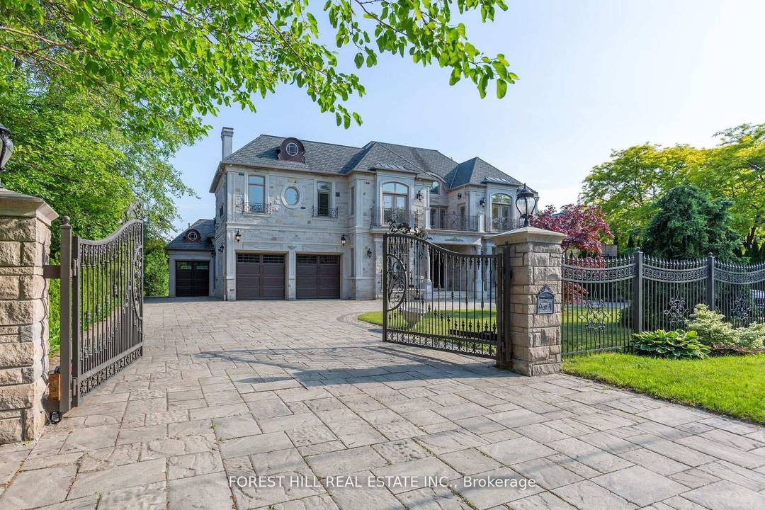 Magnificent chateau inspired an exclusive gated entrance amp ; circular driveway lead to the L U X U R Y grand residence on a beautiful 100ftx206ft in the prestigious St.