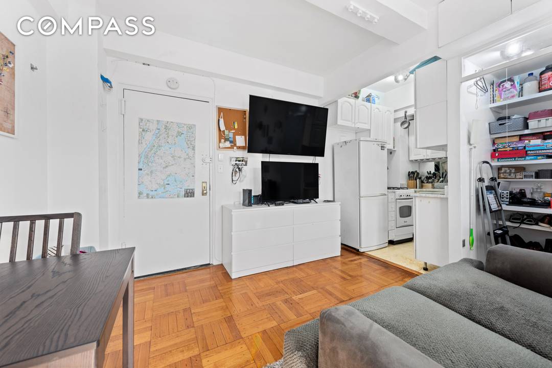 Sun filled studio in The Alden on Central Park West.