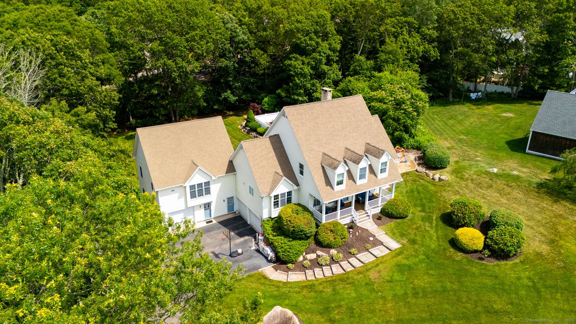 Welcome to 11 Hamilton Road a peaceful and private retreat located at the end of a cul de sac, abutting 109 acres of preserved land in Glacier Park, protected by ...