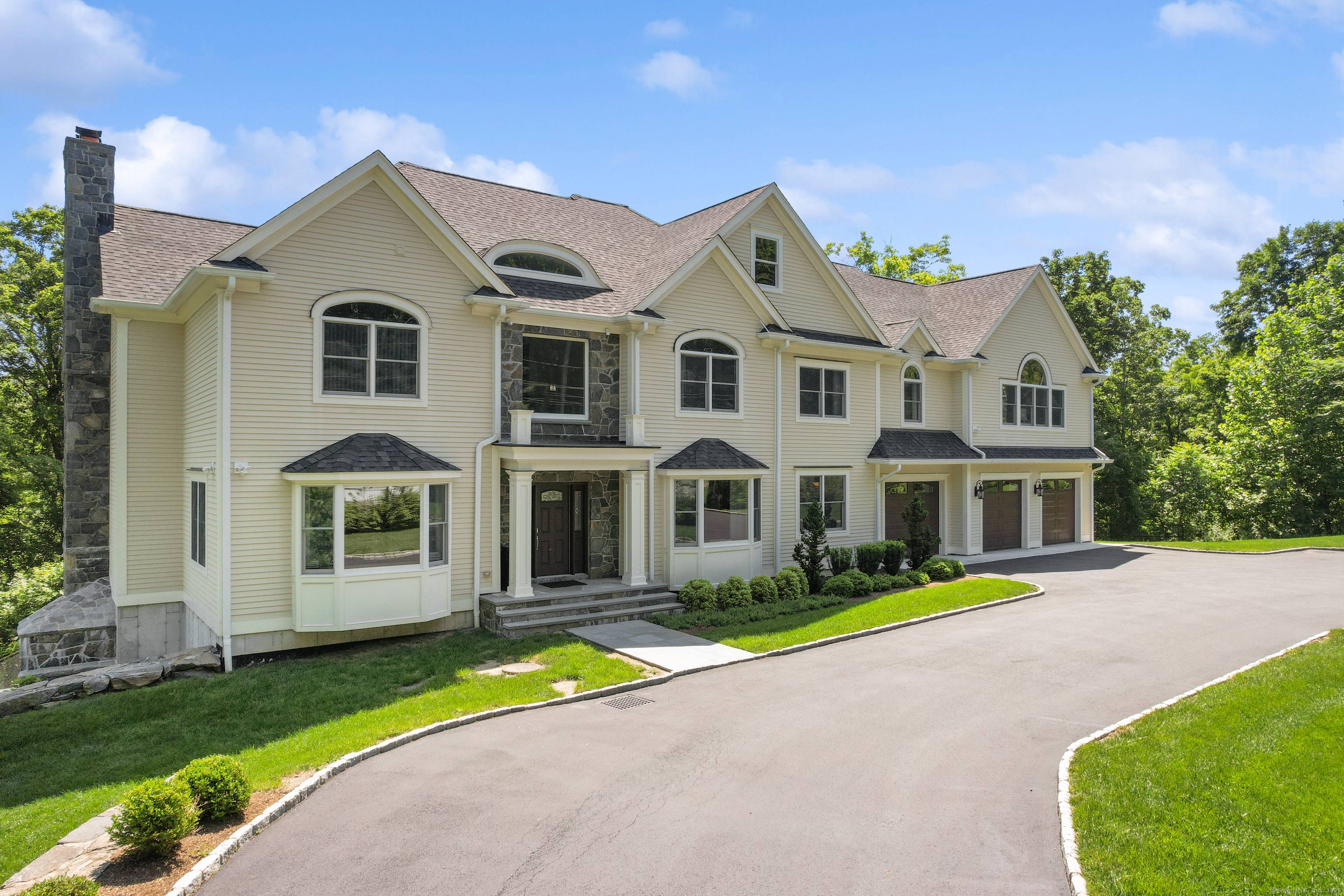 Stunning five bedroom, newer construction Colonial in sought after neighborhood in North Stamford offering luxury and attraction.