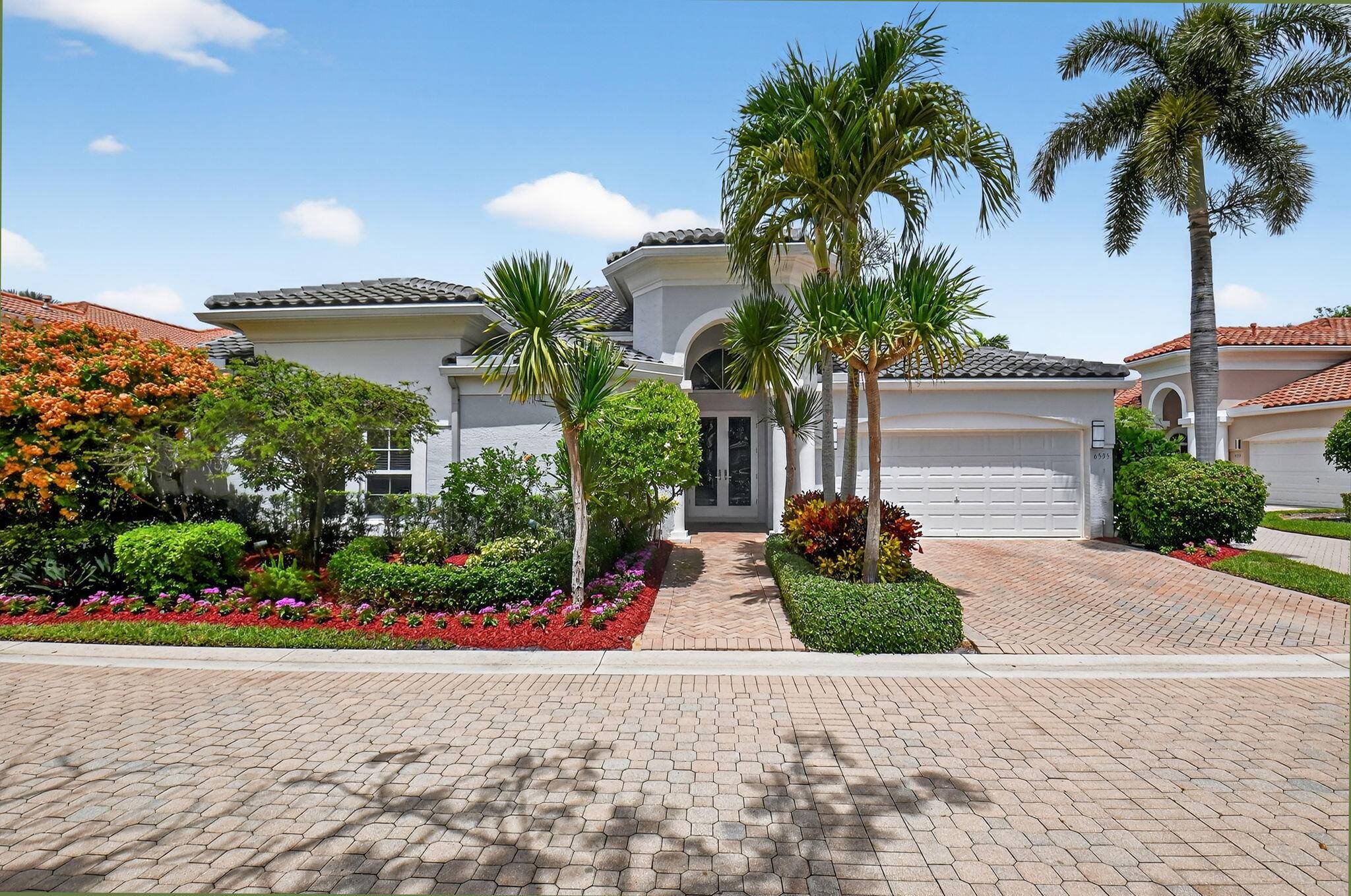 Experience the allure of this charming home in the coveted Somerset village within the prestigious Woodfield Country Club.