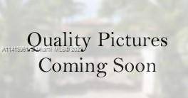 This stunning single family home is situated in Carible Lakes, on a generous 5, 427 s f lot and boasts a spacious 2 car garage.