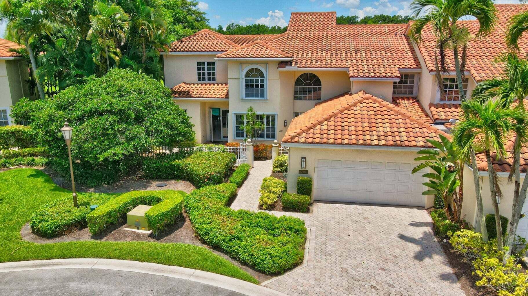 Located at the end of a cul de sac in the Cloisters, this huge 6 bedroom 7 bath townhome is situated on a spectacular lot overlooking the Broken Sound Club ...