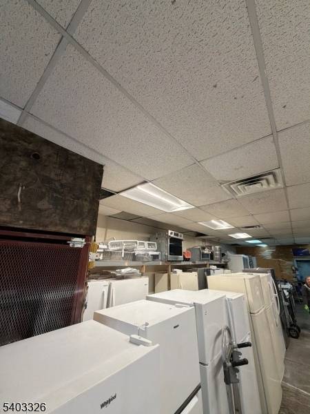 24X88 COMMERCIAL GARAGE CURRENTLY BEING USED AS A MECHANICAL SHOP.