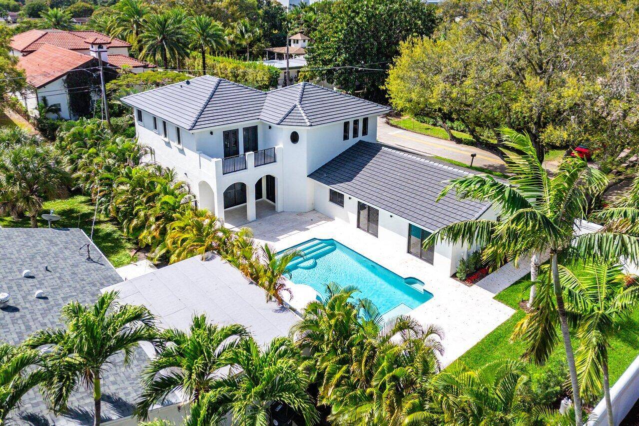 Welcome to this stunning TURN KEY East Boca home located in the sought after neighborhood of Palm Beach Farms.