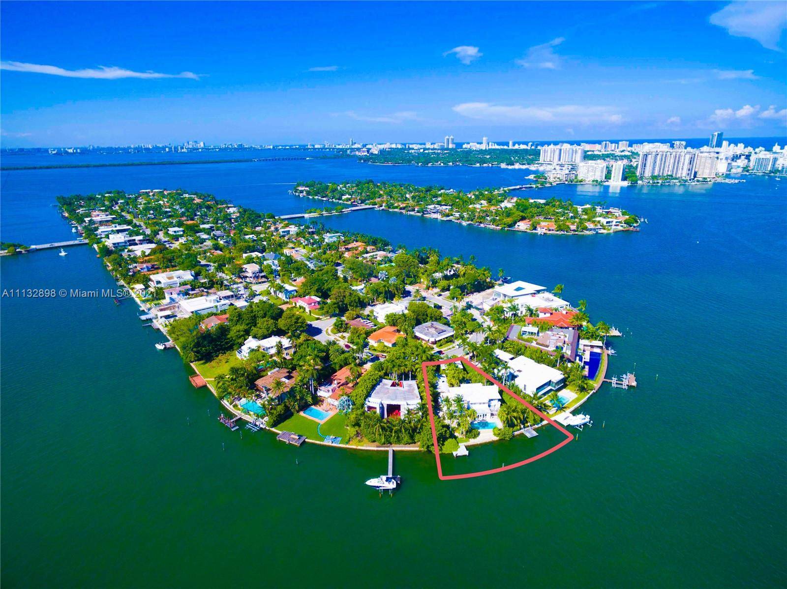 SEASONAL FURNISHED RENTAL VENETIAN ISLANDS VILLA ON OVERSIZED PIE SHAPED LOT WITH DIRECT DOWNTOWN WIDE BAY VIEWS OVERLOOKING MAGICAL SUNSETS ON THE TIP OF DILIDO ISLAND !