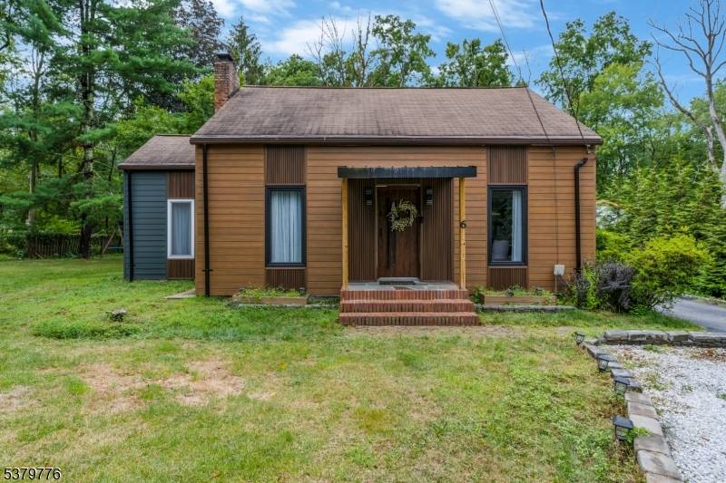 This beautifully updated 3 bedroom modern style Cape offers an inviting open concept living area, complete with a fireplace and stylish wood floors in chic neutral tones truly move in ...