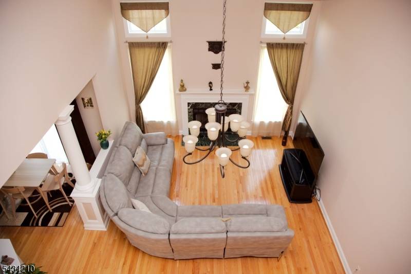 Enjoy coastal living in this spacious and bright 4bd 4bath custom colonial located in a desirable Lighthouse Bay Waterfront Community.