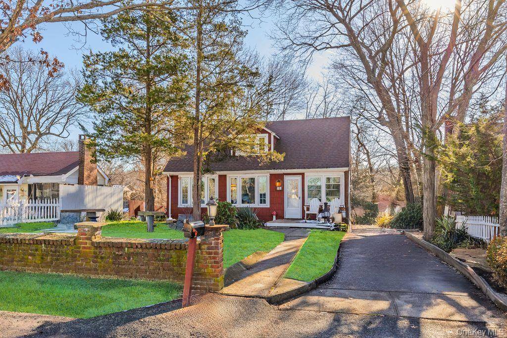 Set in the heart of coastal Rocky Point, this charming 2 bedroom, 2 bath Cape Cod offers timeless character paired with thoughtful flexibility.