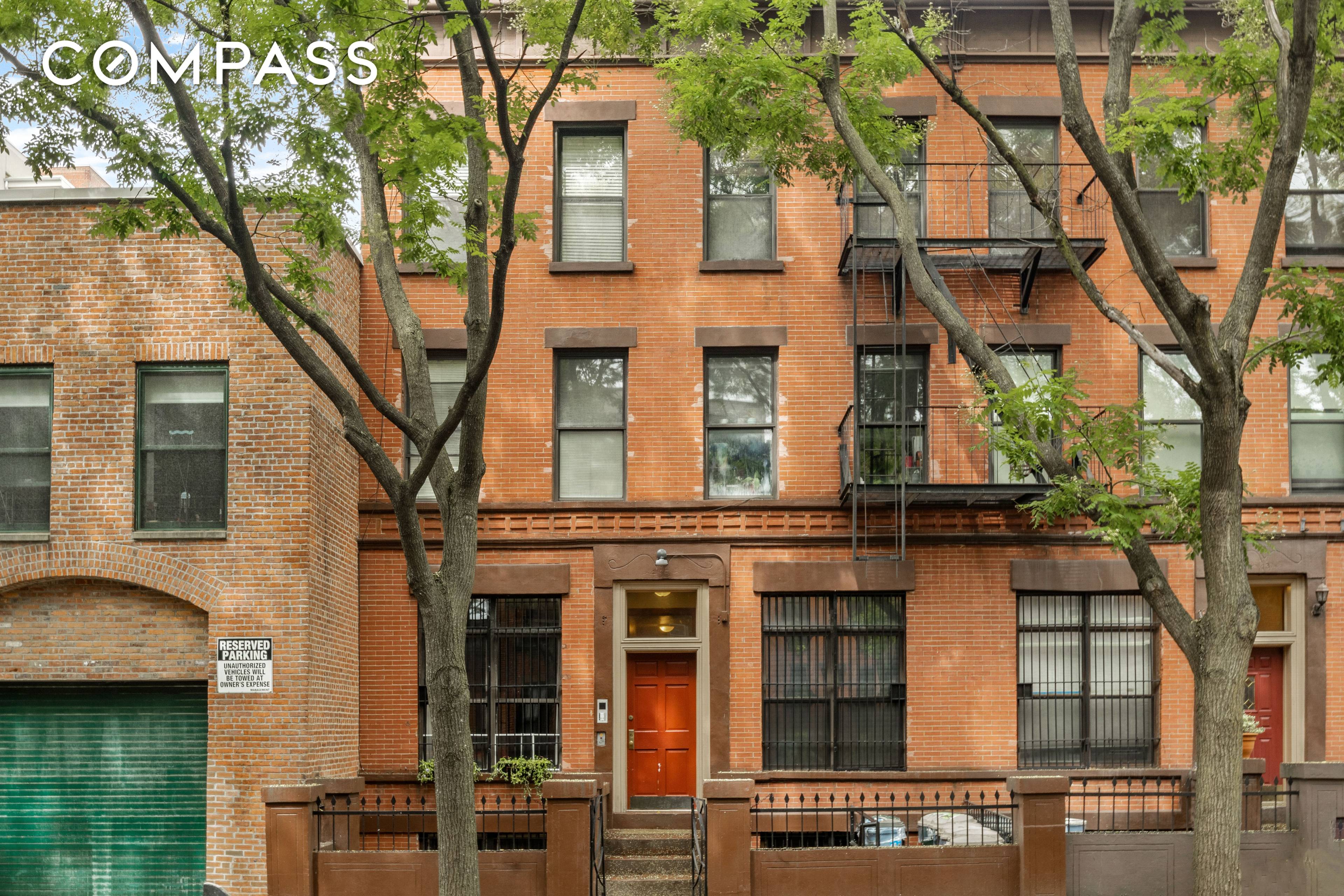 Welcome to this charming 1350 square foot duplex flooded with natural light, courtesy of its inviting large front windows.
