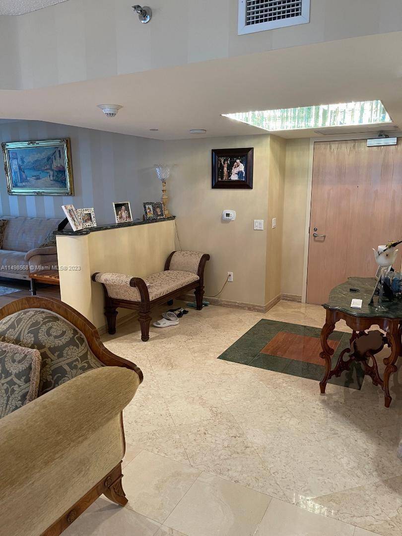 Beautiful furnished ocean front apartment with 2 Bedrooms and 2 bathrooms Den.