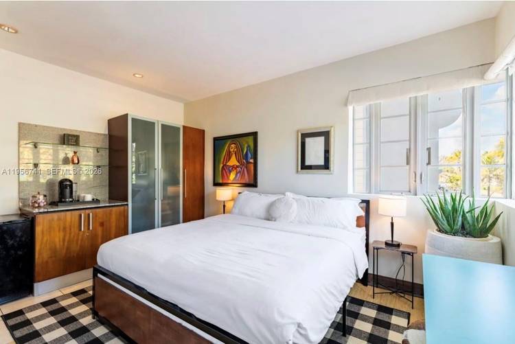 Own a corner oceanfront residence on iconic Ocean Drive with direct views of Lummus Park, the beach, and the Atlantic.