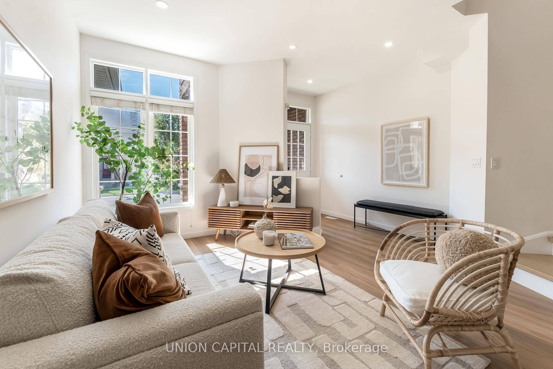 Step into modern living at 198 Bur Oak Ave !