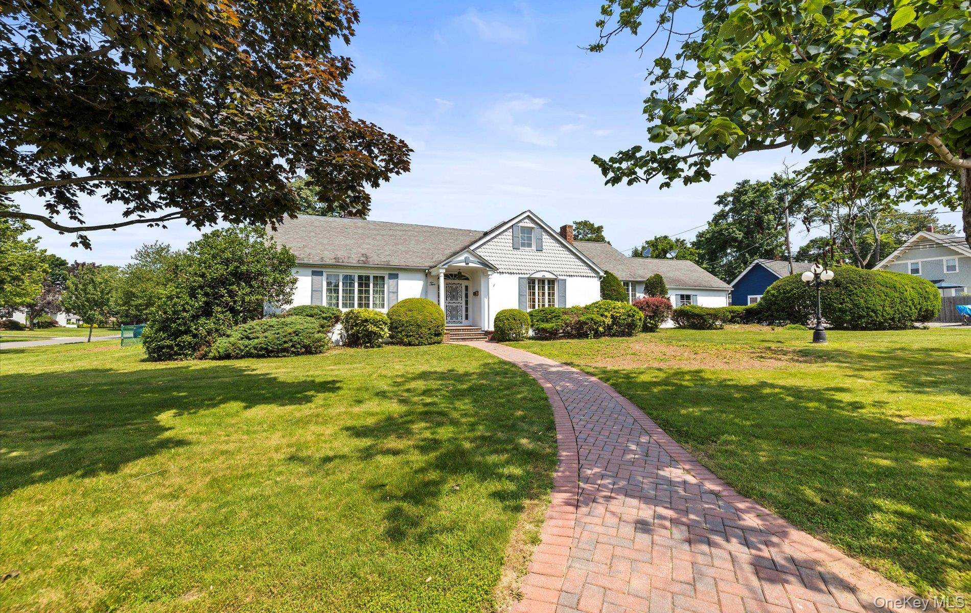 This one of a kind residence combines timeless charm with distinctive architectural details and spacious living.
