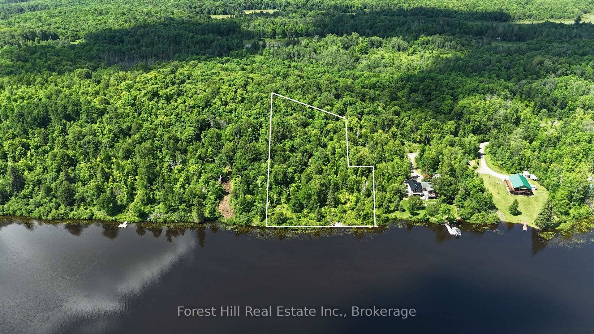 Welcome to your future retreat on the peaceful shores of Jacks Lake, also known as Arthurs Lake, in picturesque Golden Valley.