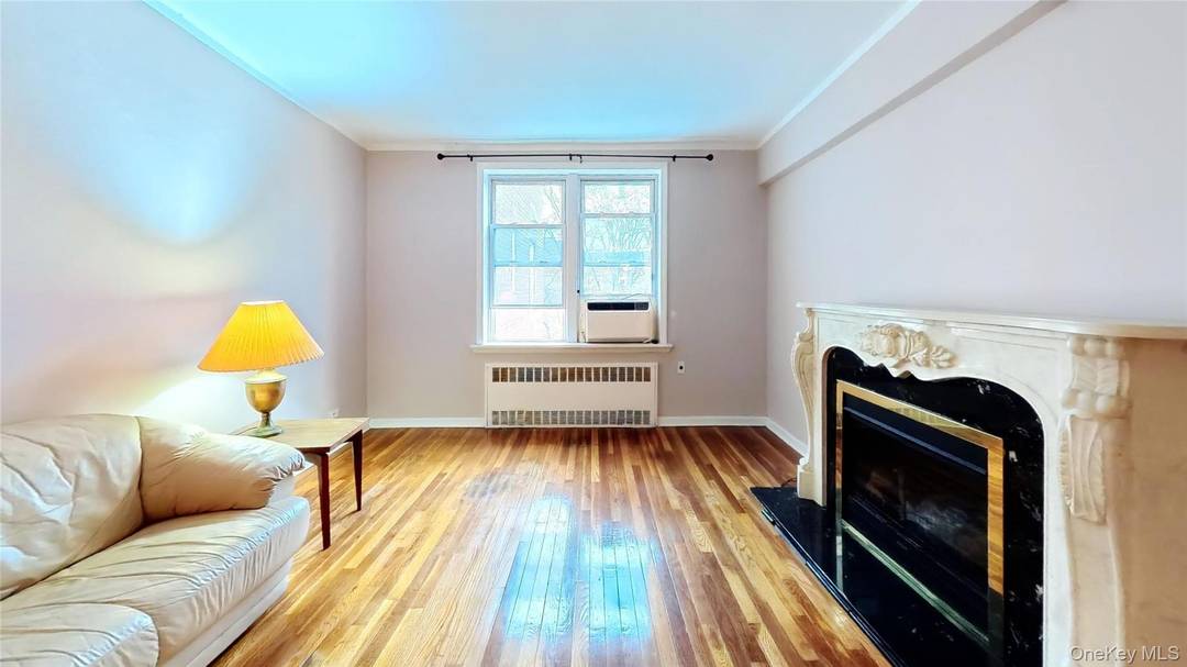 Welcome to this inviting top floor residence, offering approximately 1000 SF of comfortable living space in a well maintained Forest Hills coop building.