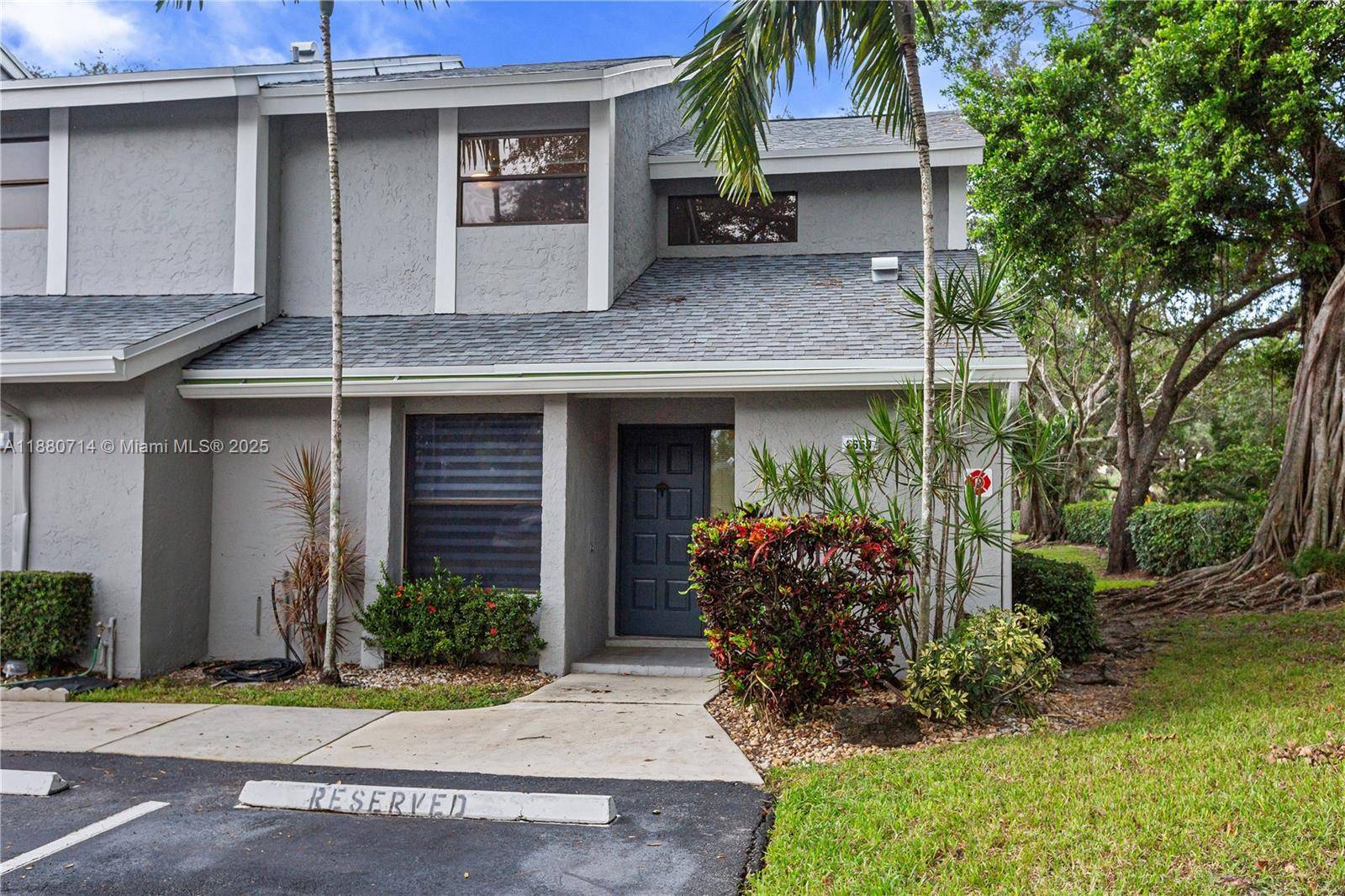 Welcome to Tartan Coconut Creek Phase I, a tranquil community where this corner townhouse is ready to be your home.