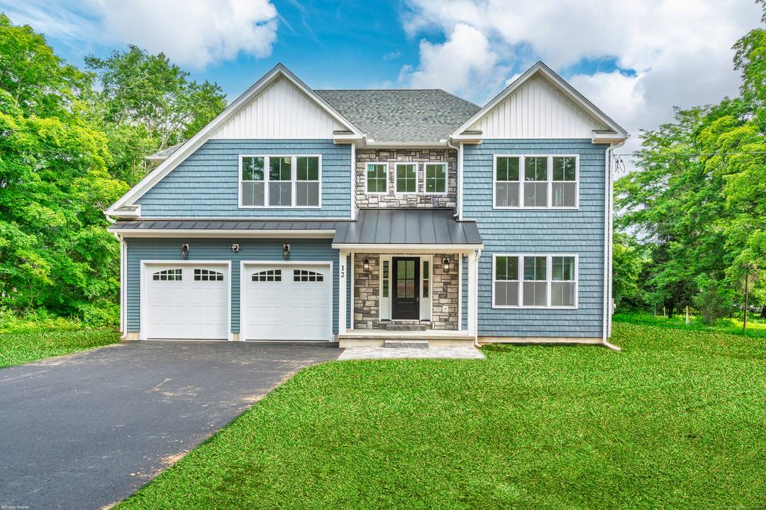 Move right into the stunning brand new construction colonial with beautiful hardwood floors throughout.
