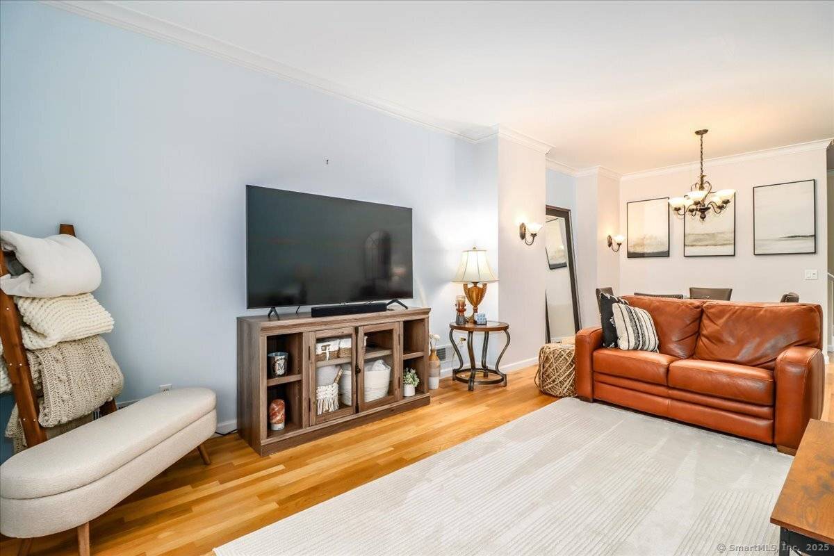 Immaculate tri level townhouse in a desirable Danbury location !