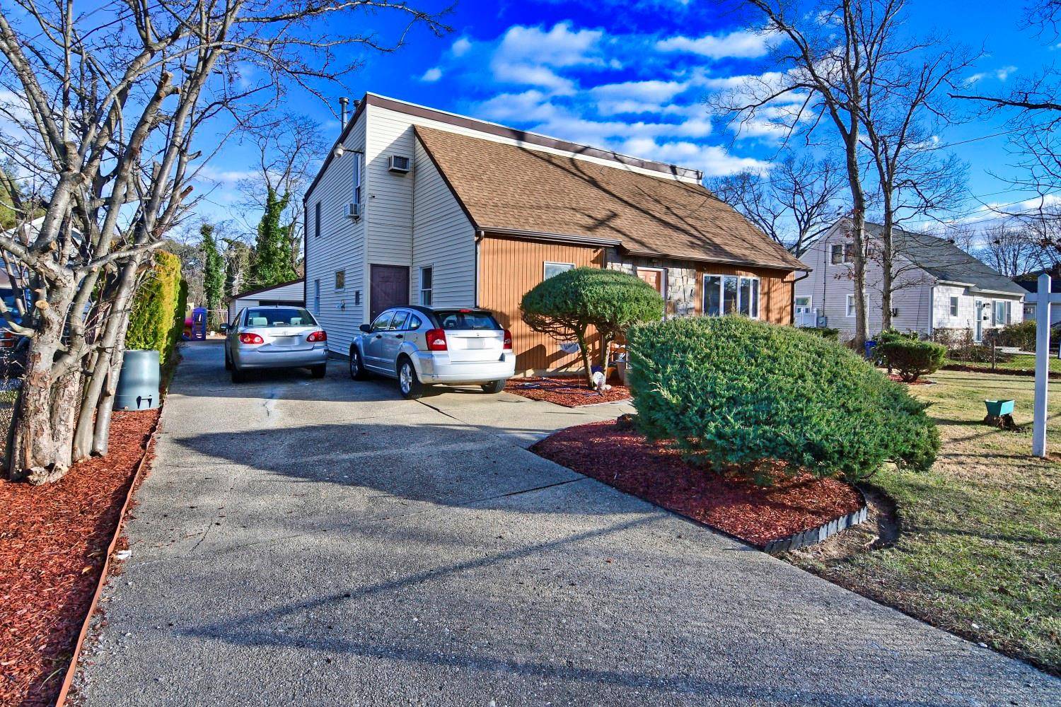 Welcome to this beautifully maintained Mother Daughter residence located on a peaceful residential street, perfect for multi generational living.