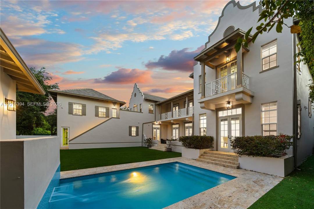 Elegant Dutch Caribbean estate designed by renowned architect Cesar Molina, set on a lush 12, 500 SF fenced lot in coveted High Pines.