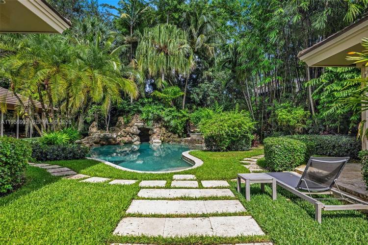 Boca Grove s most prestigious estate is located on a corner lot in the Rosedown Ct.