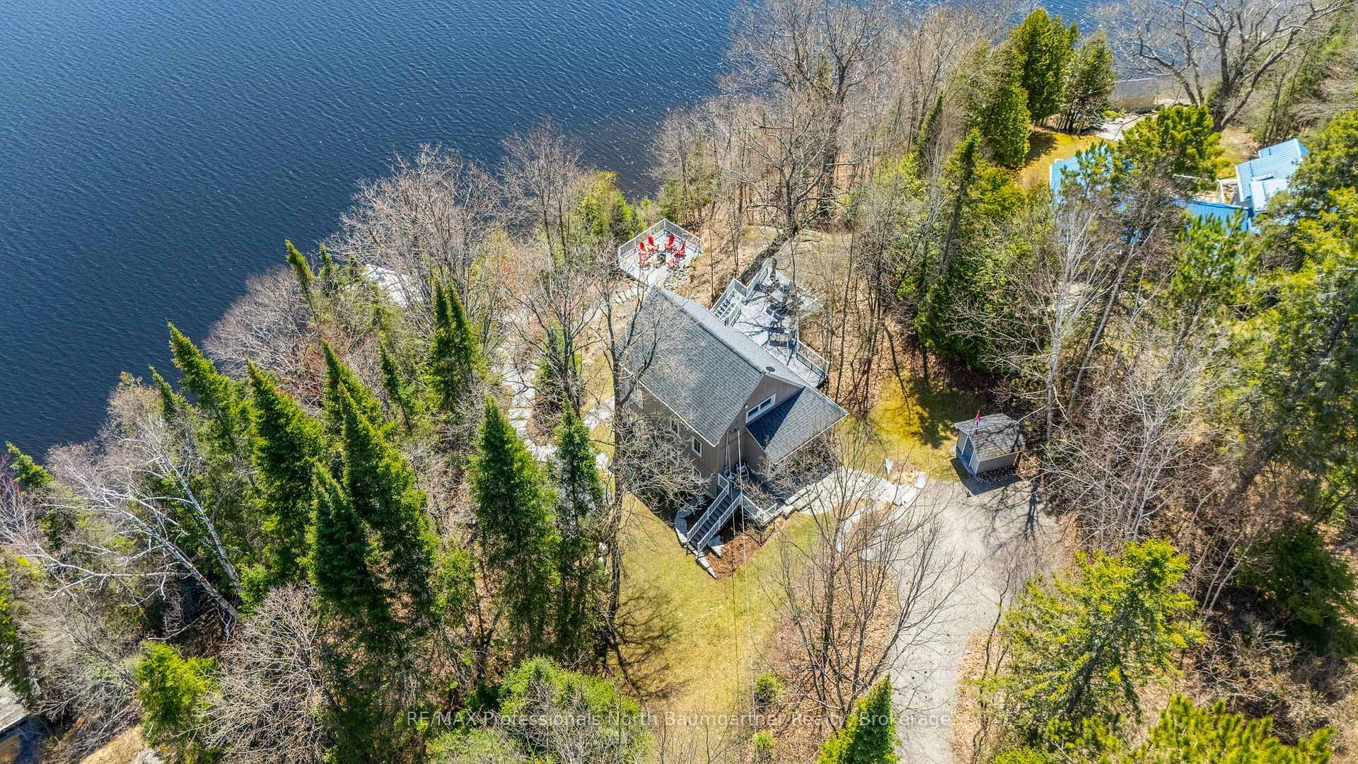Discover exceptional waterfront living at 1025 Yukon Trail in Minden, positioned along Kashagawigamog Lake in Haliburton County.