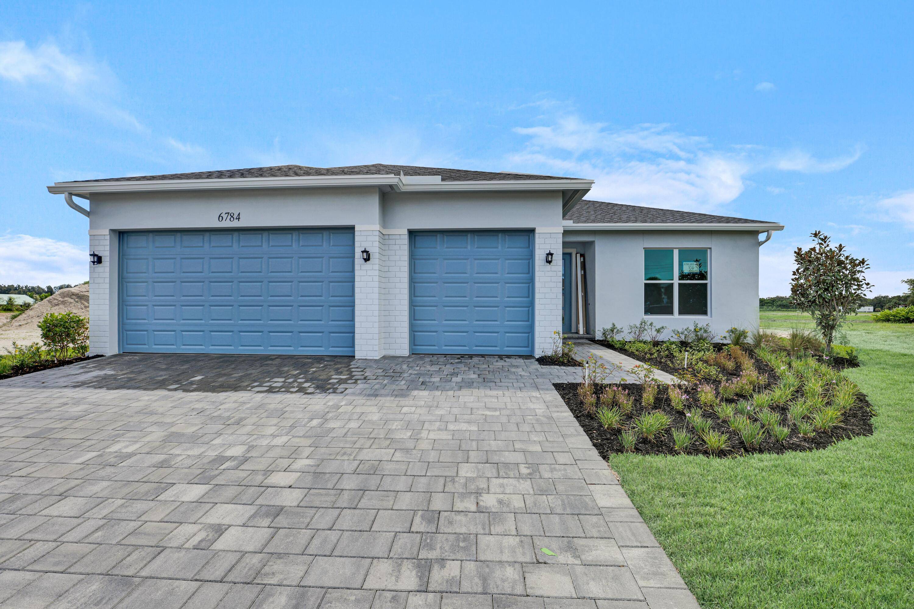 Homesite 59 is an exquisite 4 bedroom, 3 bathroom home boasts an open concept layout that seamlessly blends style and functionality, featuring a stunning primary suite for your ultimate comfort.