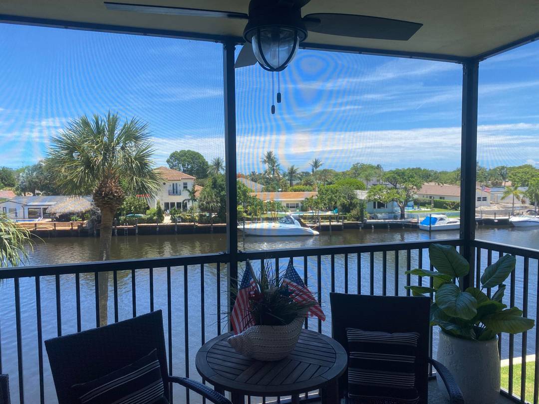 Stunning Boca Raton Waterfront Seasonal Rental Beautifully renovated, tastefully furnished deluxe model with captivating Hillsboro Canal views from a private screened balcony.