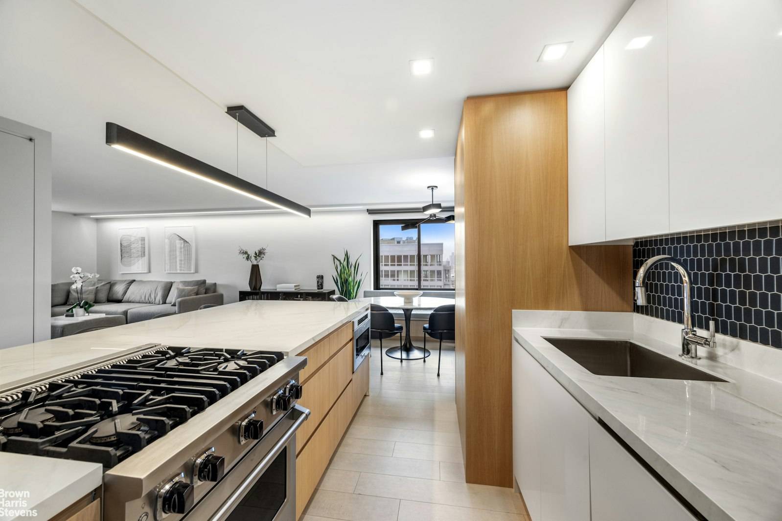 Welcome home to One Sherman Square, Residence 24B, where high design meets high altitude.