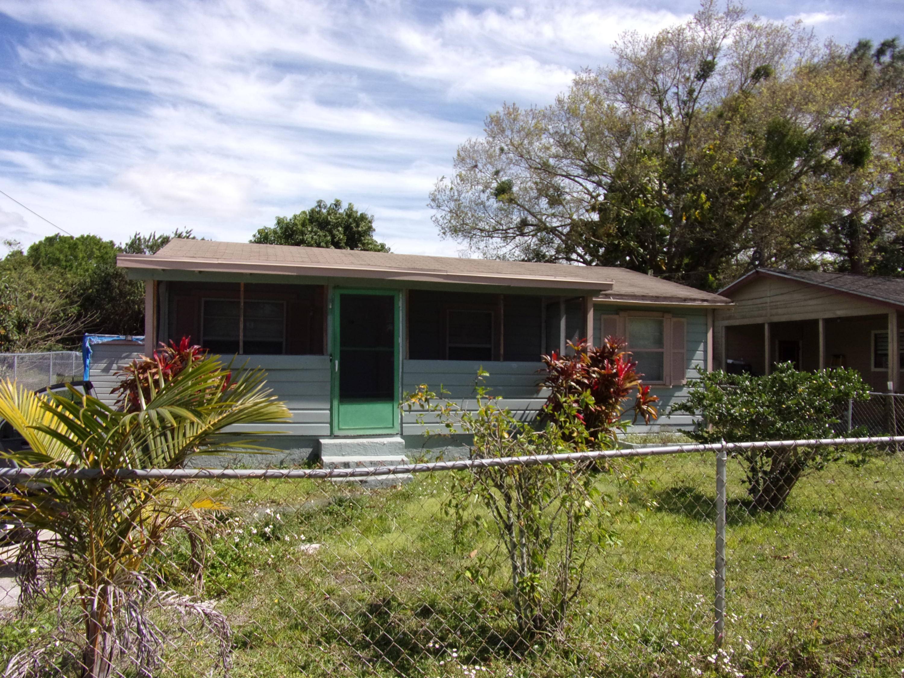 This cozy two bedroom, one bathroom house offers lots of potential for the aspiring handyperson.