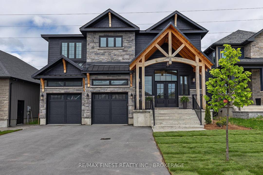 Welcome to 848 Windermere Drive an executive custom built home in one of Kingston's most desirable neighbourhoods !
