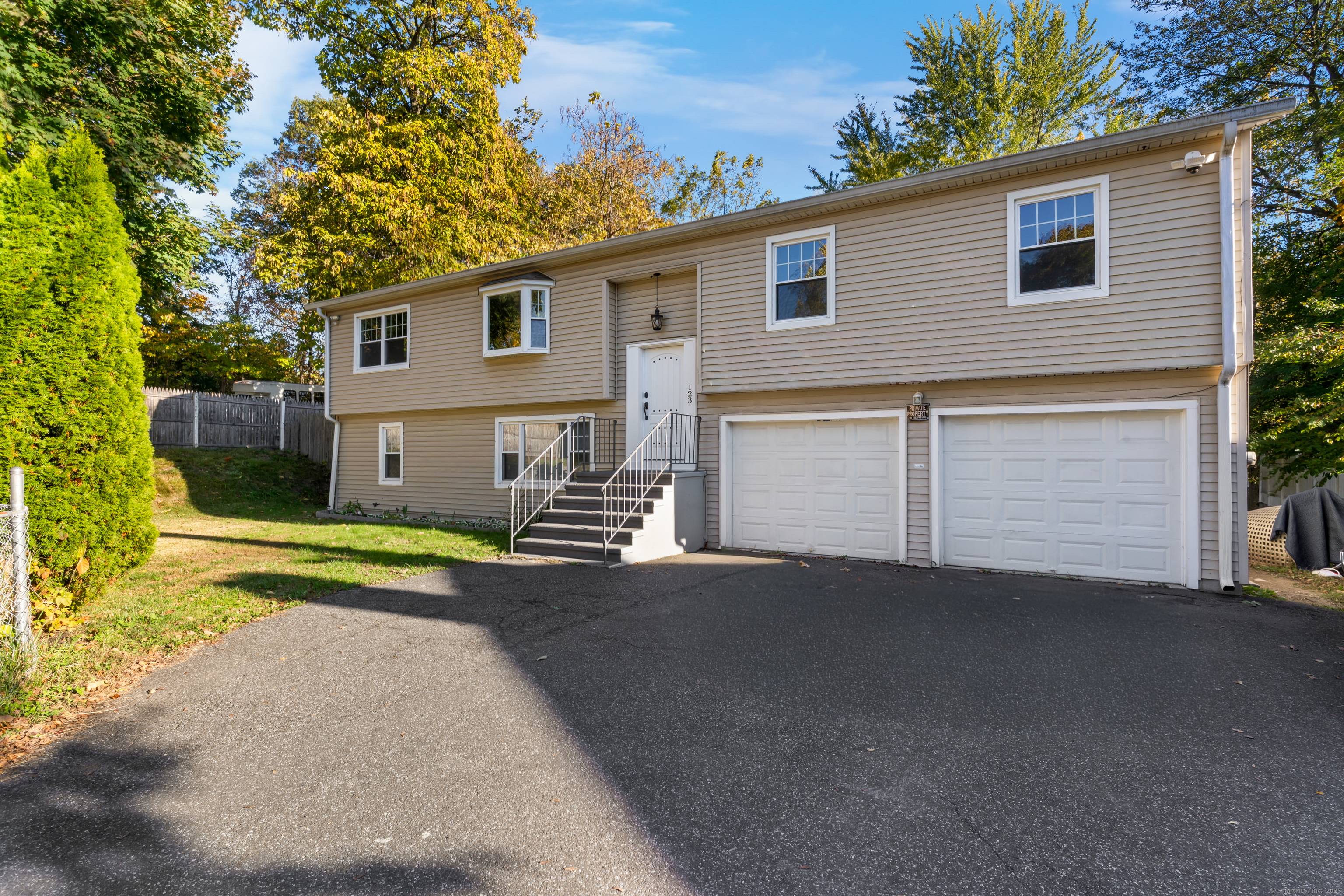 This spacious home features 4 bedrooms, 3 full bathrooms, central air, a two car garage, and a generous backyard.