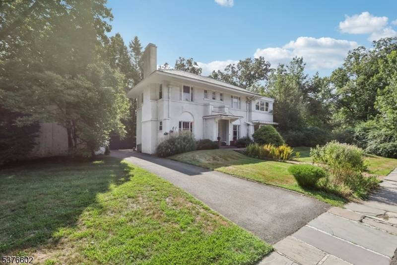 This charming and spacious home offers 4 bedrooms, 2.