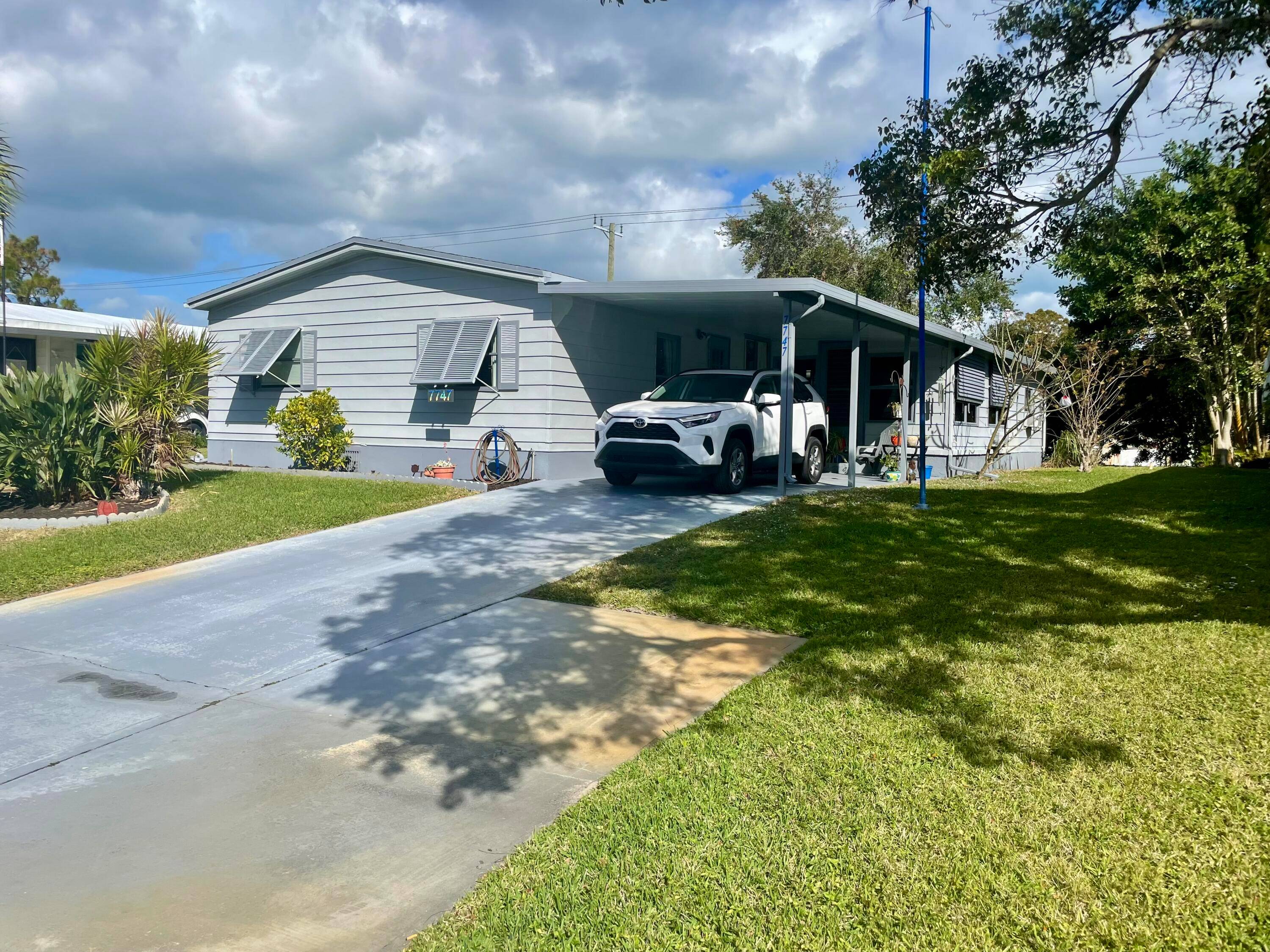 Rare three bedroom, two bath home in the very active 55 plus community of Cambridge where you own your land.