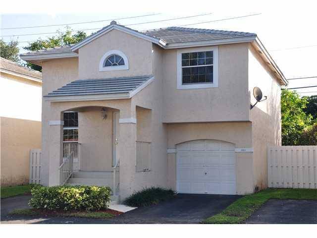 This is a charming fully furnished 3 bedroom 2 1 2 bath two story home situated in Quatraine V located in Jacaranda.