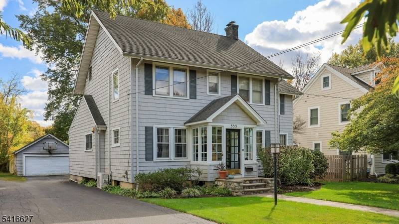 Located on a tree lined street minutes to downtown Westfield this traditional Colonial is rich with character, comfort and modern updates.