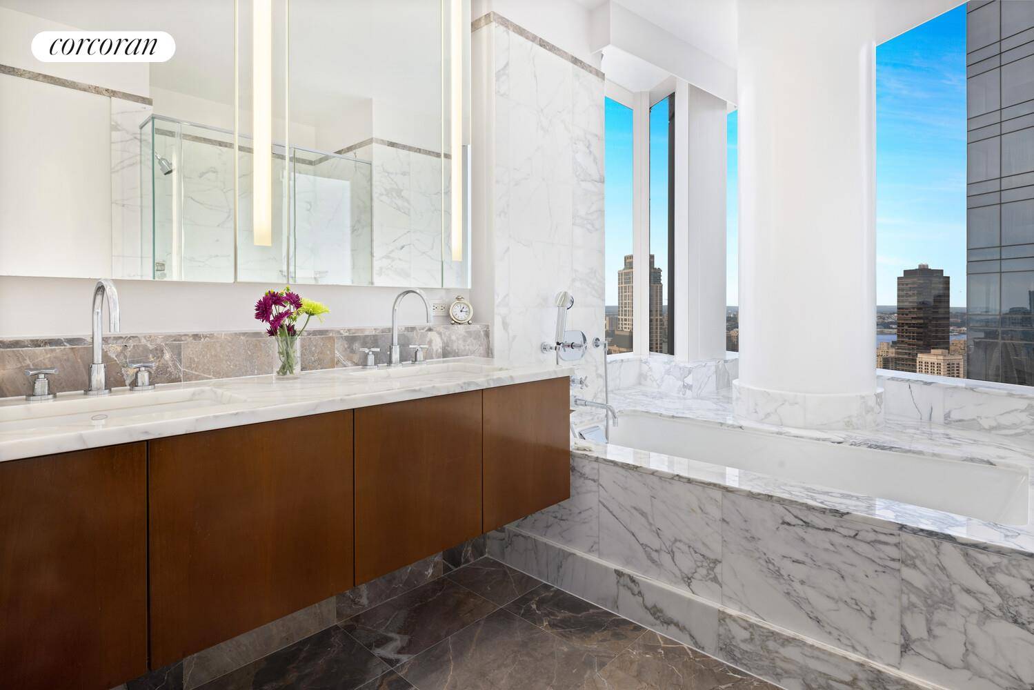 Stunning Central Park and Hudson River views are captured from this impeccably designed two bedroom, two and a half bathroom corner residence, perched on the 61st floor of the prestigious ...