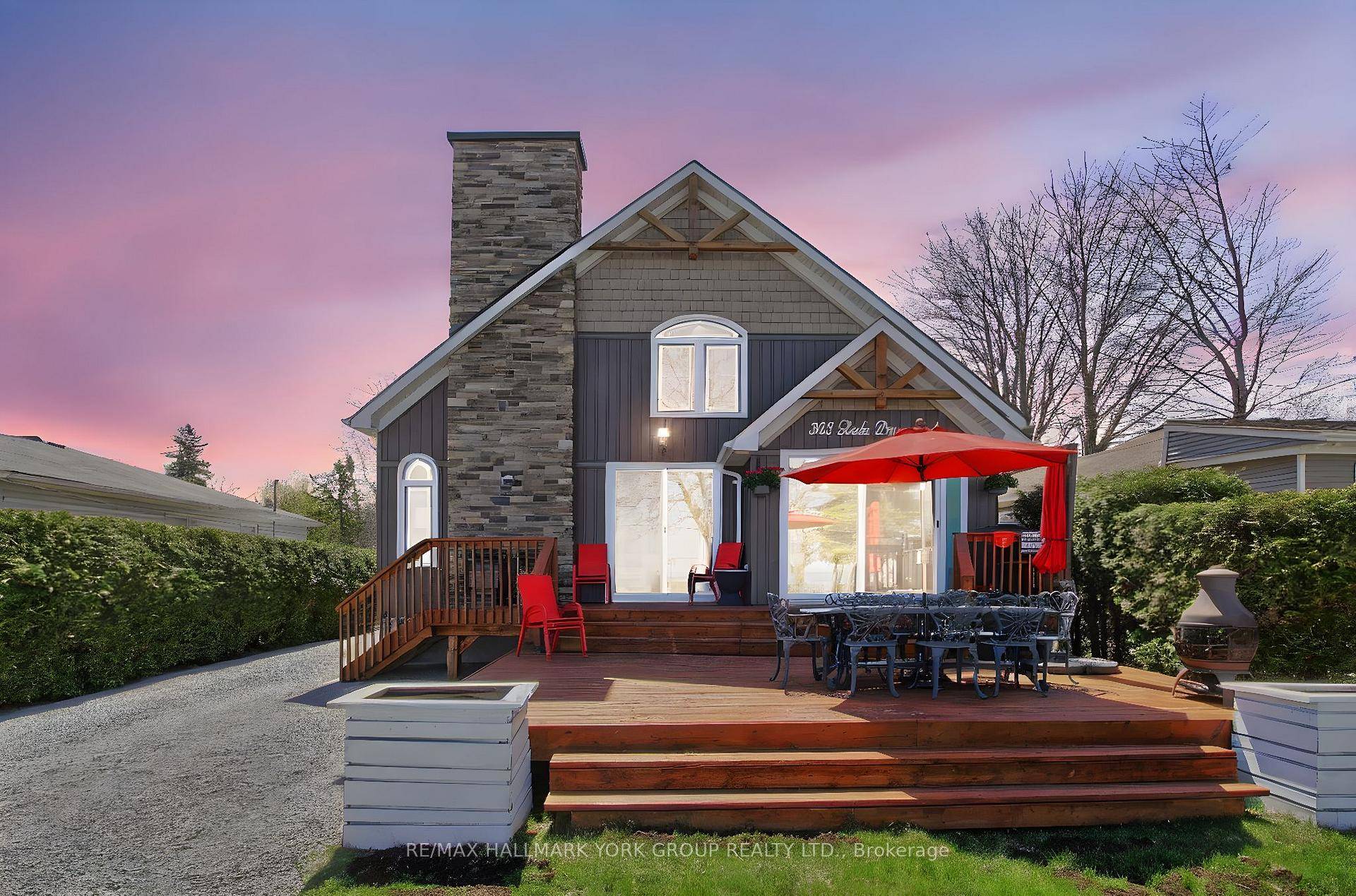 Stunning Fully Furnished Two Story Lake Home With Incredible Sunrise and Sunset Views.