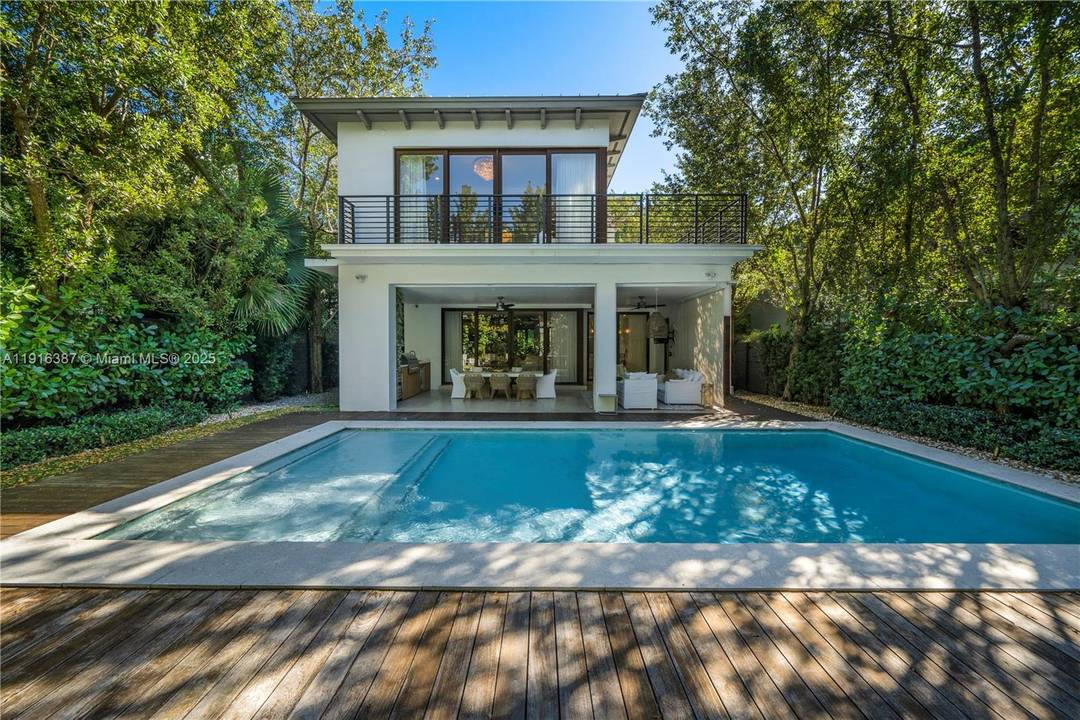 Experience luxury living at its finest in this modern two story oasis in the desirable Coconut Grove, boasting soaring high ceilings, 5 spacious bedrooms, 5 full baths, and 2 half ...