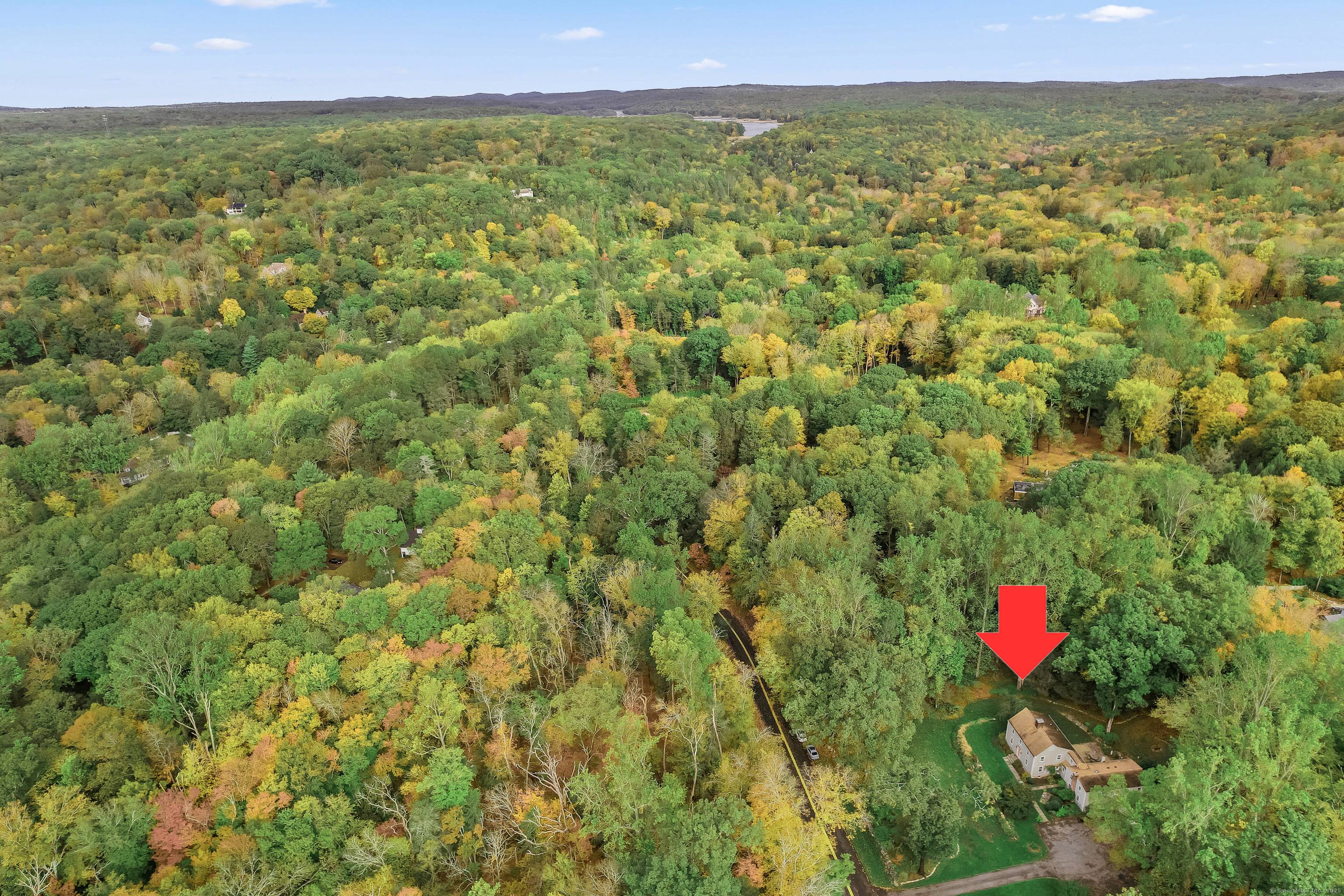 This distinctive Colonial offers tremendous curb appeal on a peaceful country road.
